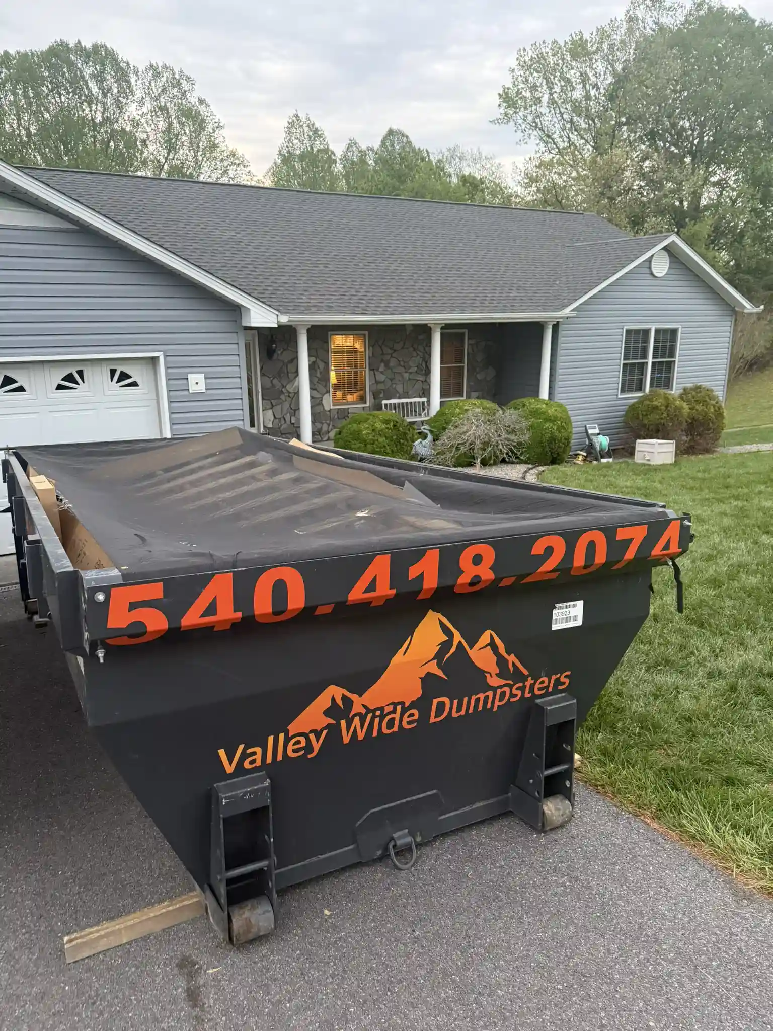 Roll-off dumpster on a job site